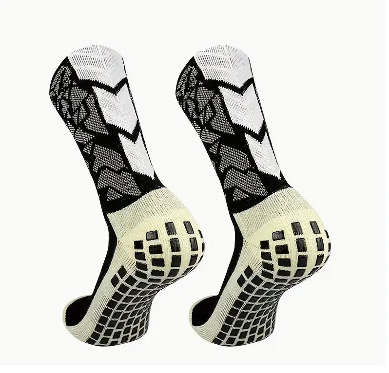 Fotballsokker, med sklisikker silikon. Sokker med spesifikk kompresjon på fotbuen, som gir utmerket støtte og stabilitet. Laget med pustende nylon elastan. Justerbar fra nummer 38 til 45.