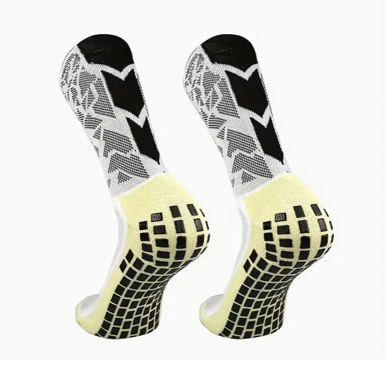 Fotballsokker, med sklisikker silikon. Sokker med spesifikk kompresjon på fotbuen, som gir utmerket støtte og stabilitet. Laget med pustende nylon elastan. Justerbar fra nummer 38 til 45.