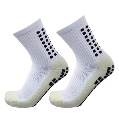 Fotballsokker, med sklisikker silikon. Sokker med spesifikk kompresjon på fotbuen, som gir utmerket støtte og stabilitet. Laget med pustende nylon elastan. Justerbar fra nummer 38 til 45.