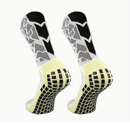 Fotballsokker, med sklisikker silikon. Sokker med spesifikk kompresjon på fotbuen, som gir utmerket støtte og stabilitet. Laget med pustende nylon elastan. Justerbar fra nummer 38 til 45.